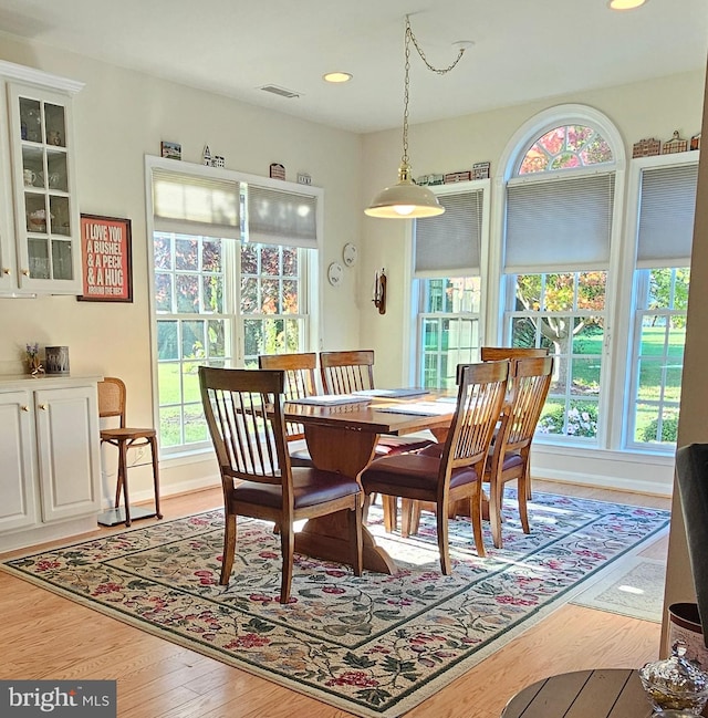 dining space featuring light hardwood / wood-style flooring