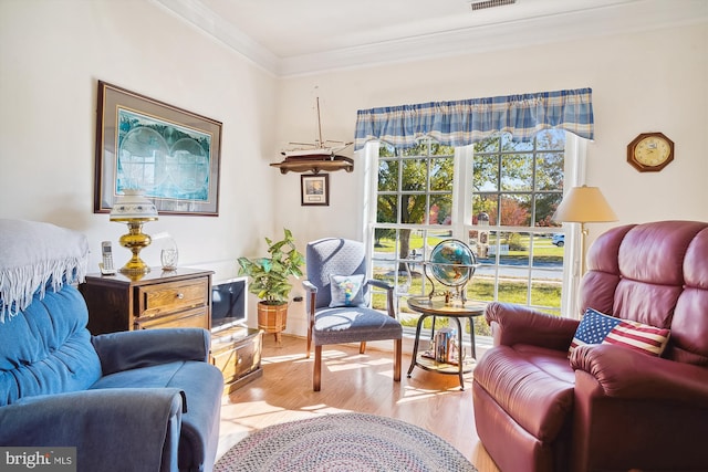 29748 Lyons Dr, Easton, MD 21601 - sitting room featuring crown molding, visible vents, and wood finished floors