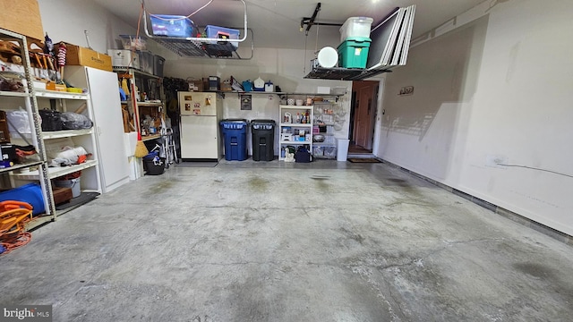 garage featuring white refrigerator