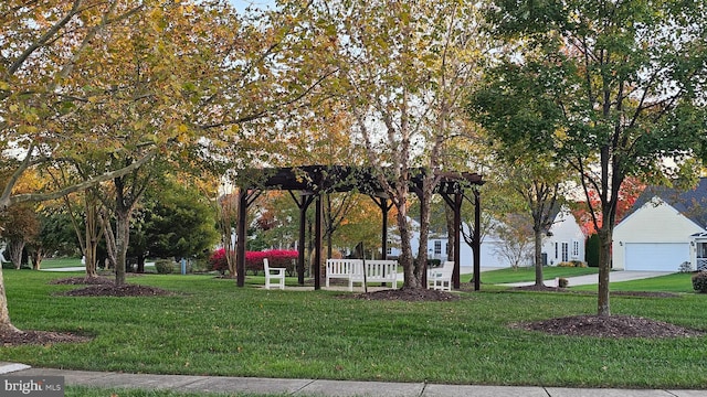 surrounding community with a lawn and a garage