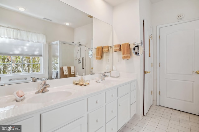 29748 Lyons Dr, Easton, MD 21601 - full bathroom with double vanity, tile patterned floors, a stall shower, and a sink
