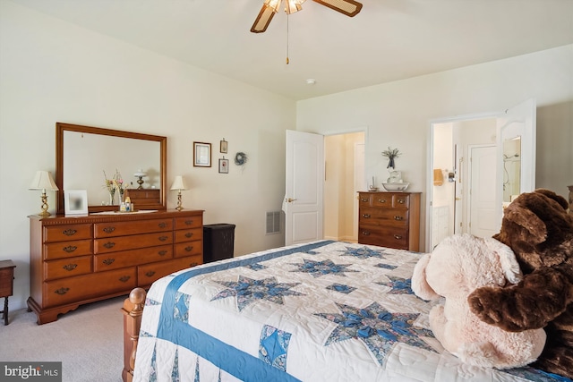 bedroom with light colored carpet and ceiling fan