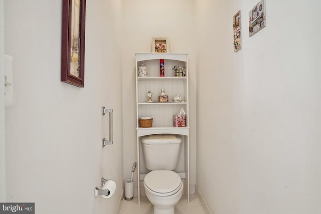 bathroom with tile patterned floors and toilet