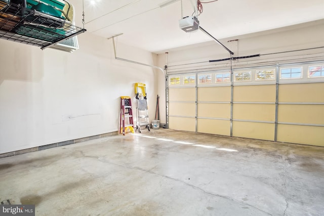 garage featuring a garage door opener