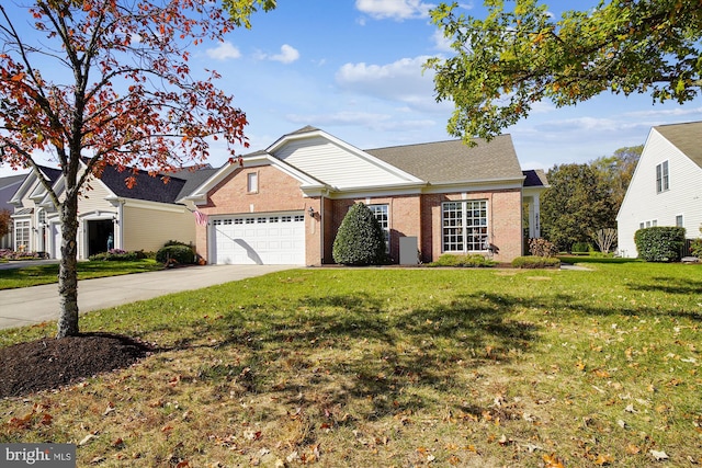 29748 Lyons Dr, Easton, MD 21601 - view of front facade featuring a front yard, brick siding, a garage, and driveway