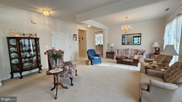 carpeted living room featuring ornamental molding and an inviting chandelier