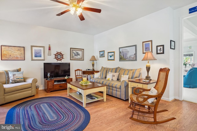 29748 Lyons Dr, Easton, MD 21601 - living room featuring a ceiling fan, baseboards, and wood finished floors