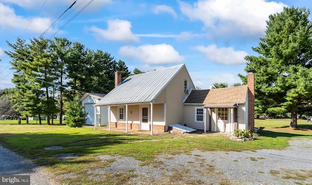 exterior space featuring a front lawn