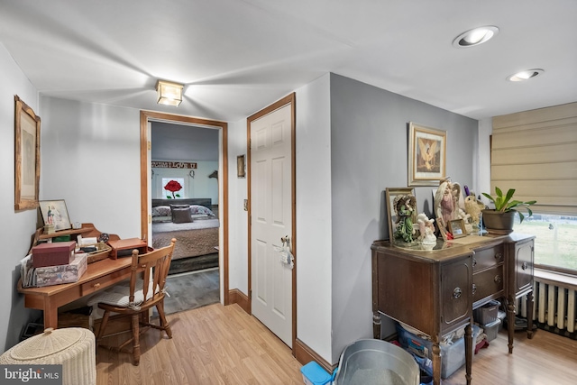 hall with light wood-style floors