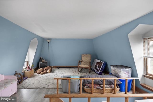 sitting room featuring wood finished floors
