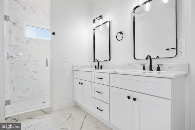 bathroom featuring vanity and a shower with shower door