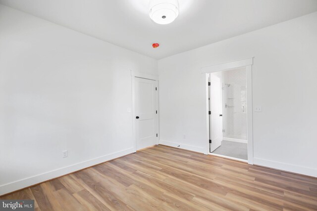 unfurnished room featuring light hardwood / wood-style floors