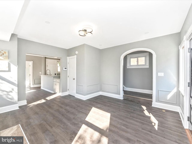 interior space with dark wood-type flooring