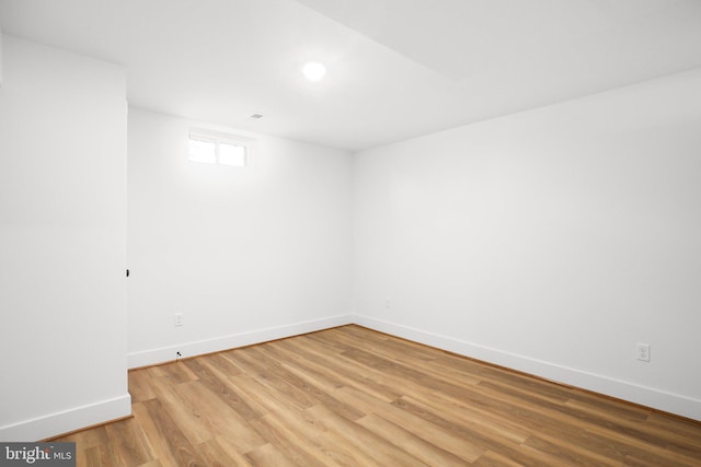 spare room with light hardwood / wood-style floors