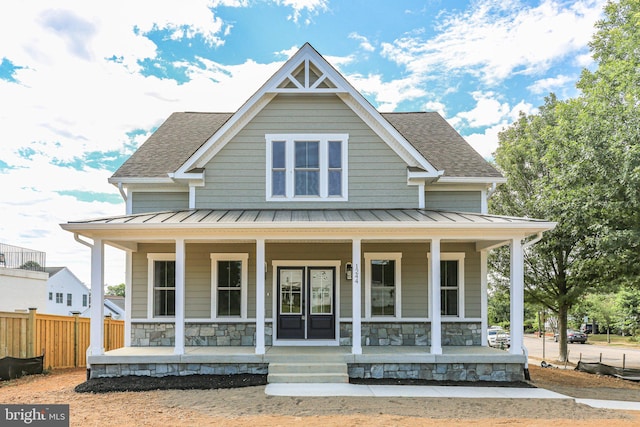 view of front of property featuring covered porch