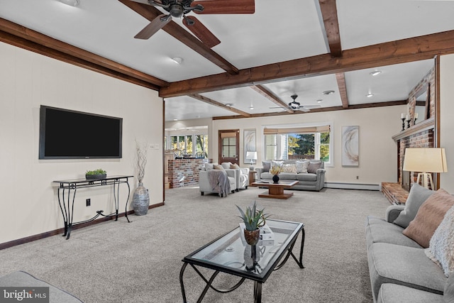 living room featuring beamed ceiling, a baseboard heating unit, light colored carpet, and ceiling fan