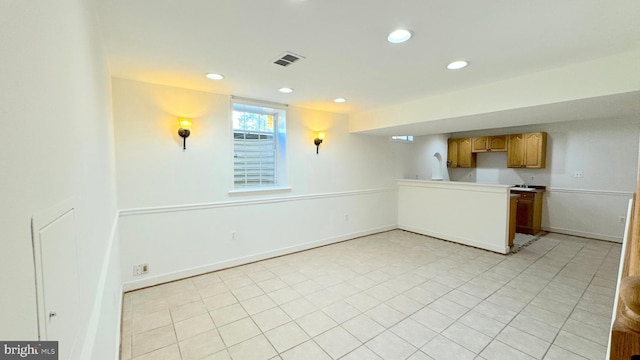 interior space featuring light tile patterned floors