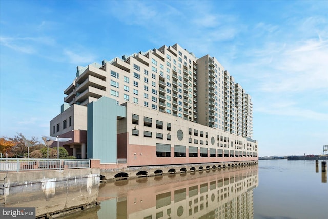 view of building exterior featuring a water view