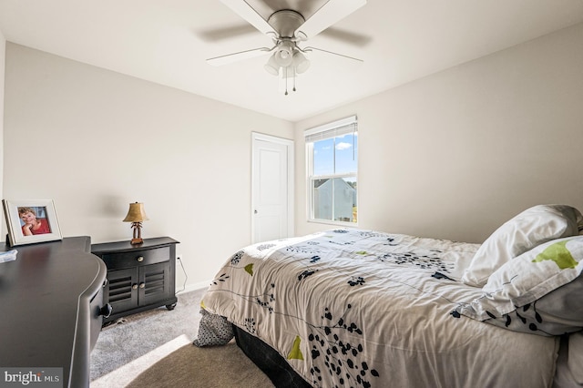 bedroom with light carpet and ceiling fan