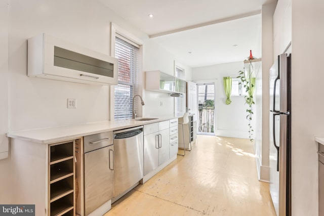 kitchen featuring stainless steel appliances and sink