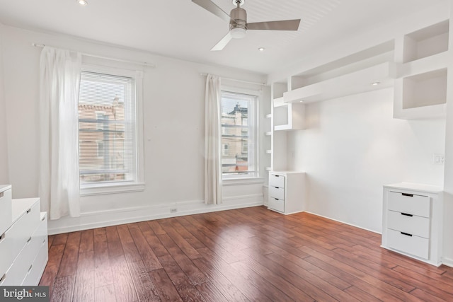 spare room with ceiling fan and hardwood / wood-style floors