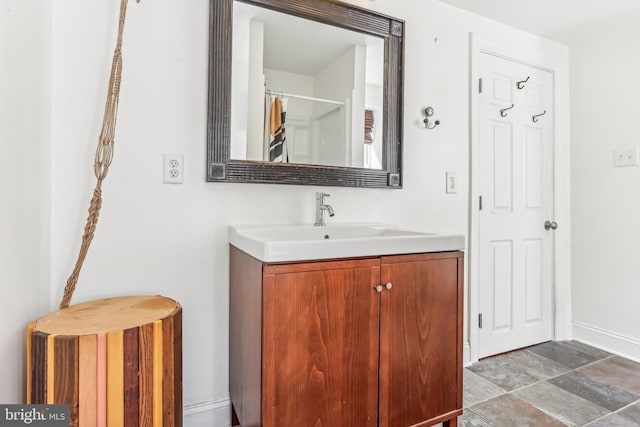 bathroom with vanity and a shower with shower curtain