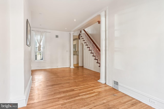 spare room with light wood-type flooring