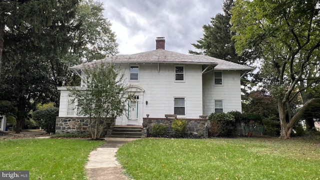 view of front of house with a front yard