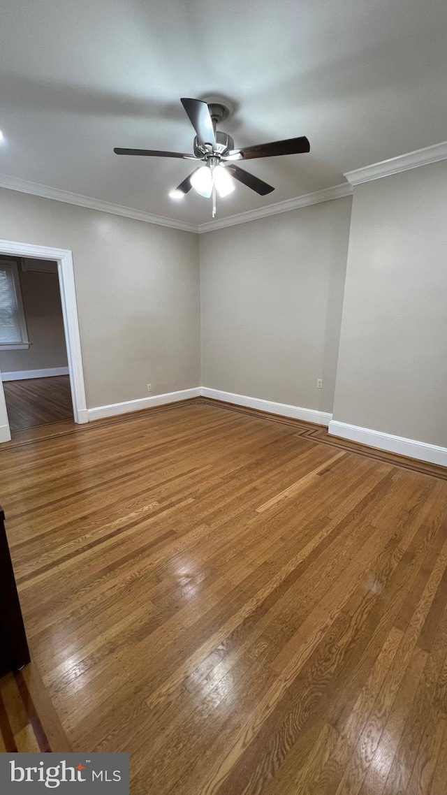 unfurnished room with crown molding, hardwood / wood-style flooring, and ceiling fan