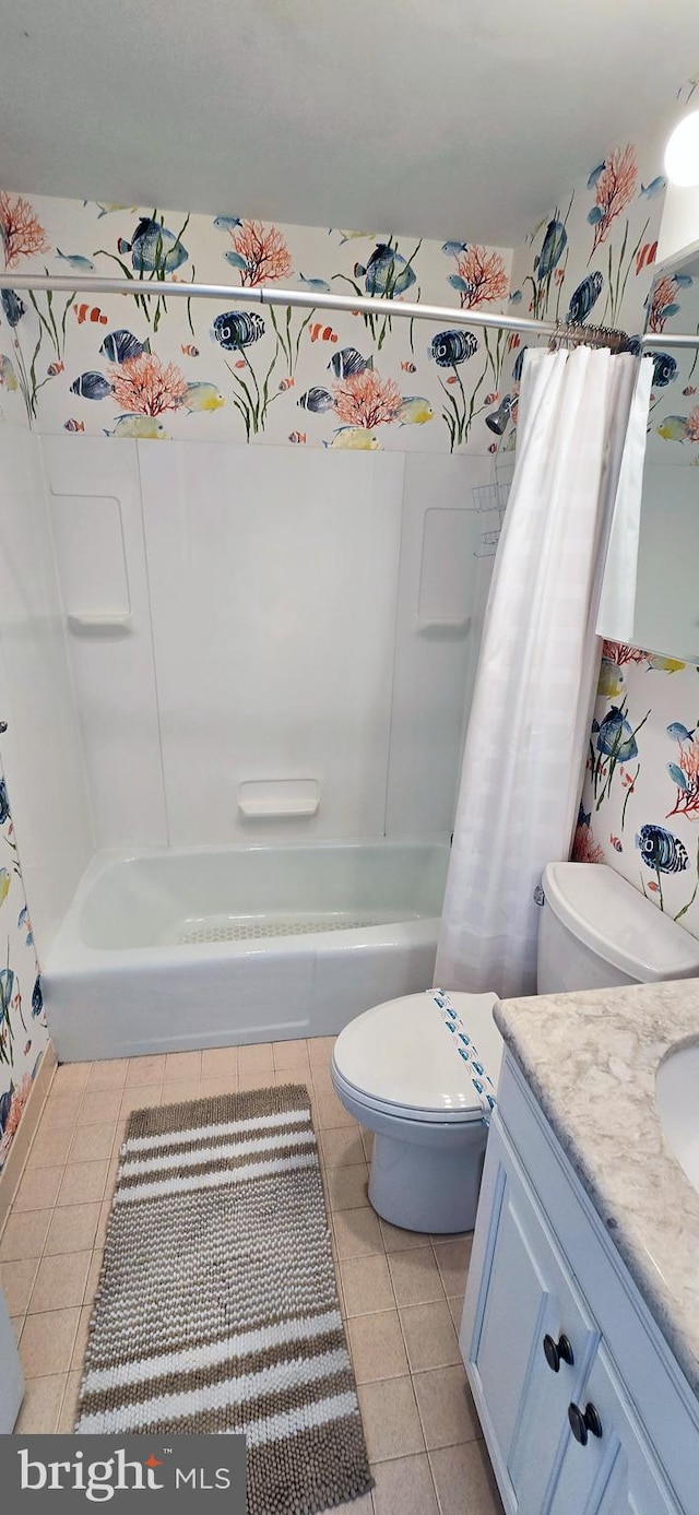 1 Virginia Ave Unit 501, Rehoboth Beach, DE 19971 - bathroom with tile patterned flooring, toilet, vanity, and shower / bath combo with shower curtain
