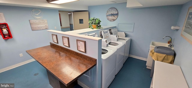 1 Virginia Ave Unit 501, Rehoboth Beach, DE 19971 - laundry area with independent washer and dryer and baseboards
