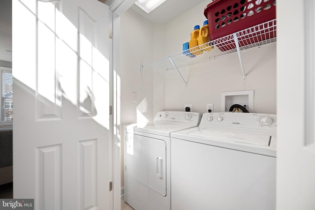 laundry room featuring washer and clothes dryer