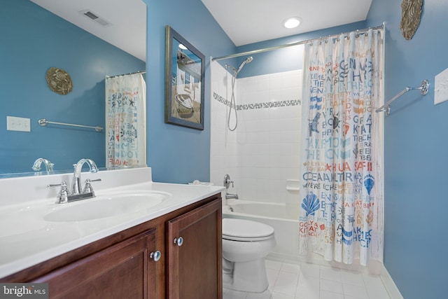 full bathroom featuring tile patterned flooring, vanity, toilet, and shower / tub combo with curtain