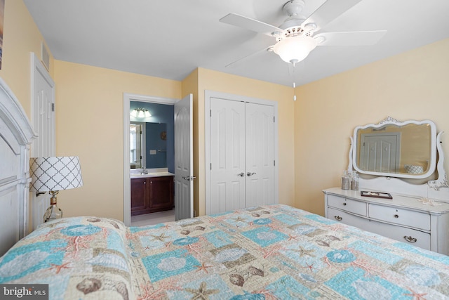 bedroom with a closet, ceiling fan, and sink