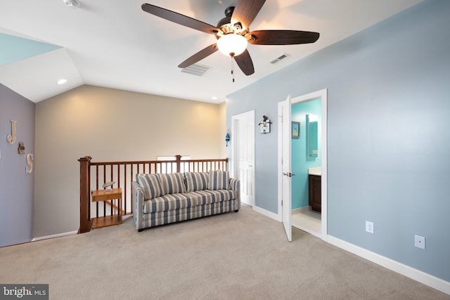 unfurnished room featuring ceiling fan, light carpet, and vaulted ceiling