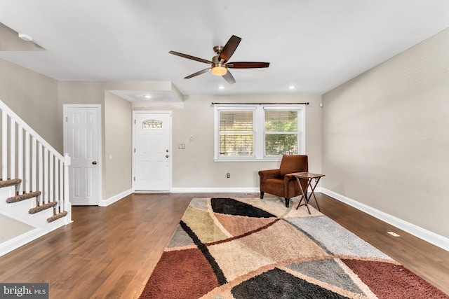 foyer featuring dark hardwood / wood-style floors and ceiling fan