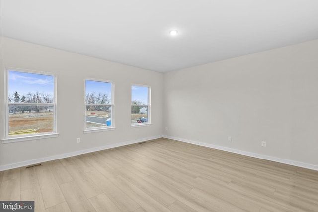 empty room featuring light hardwood / wood-style floors