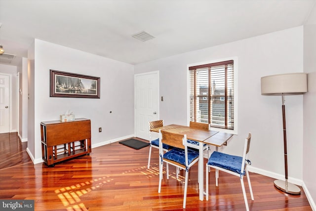 dining area featuring hardwood / wood-style flooring