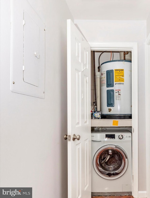 laundry area with washer / dryer, water heater, and electric panel