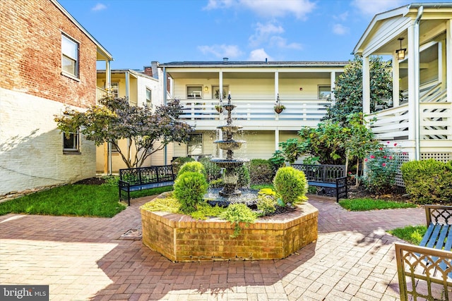 exterior space with a balcony