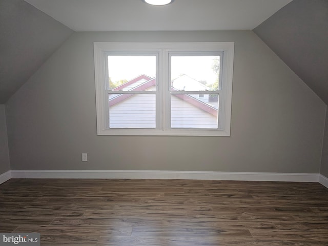 73 Genesee Ln, Willingboro, NJ 08046 - additional living space with dark wood-type flooring, vaulted ceiling, and baseboards
