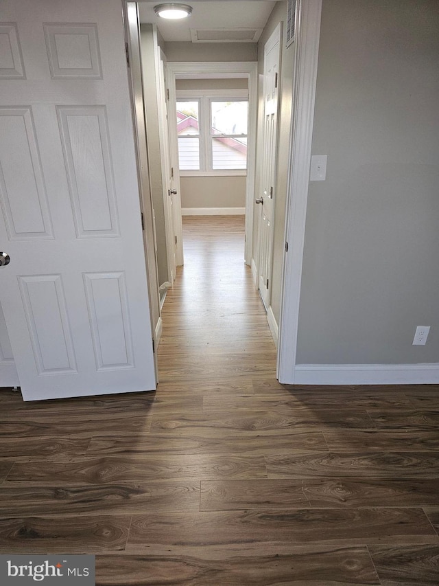 73 Genesee Ln, Willingboro, NJ 08046 - corridor with baseboards, visible vents, and dark wood-type flooring