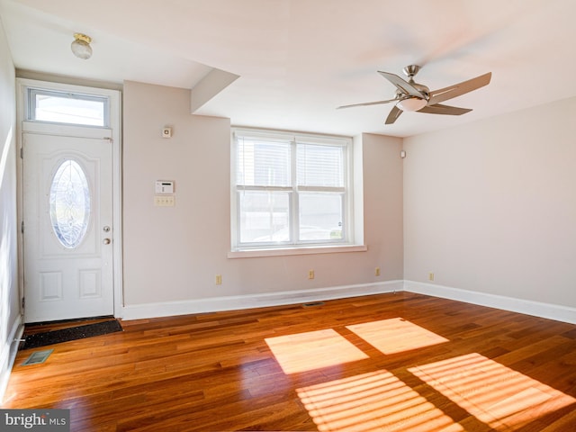 entrance foyer with wood-type flooring and ceiling fan