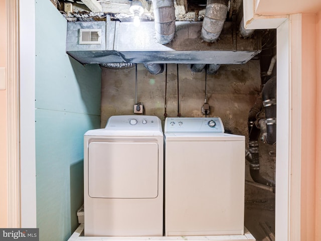 laundry room featuring independent washer and dryer