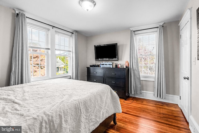 bedroom featuring hardwood / wood-style flooring