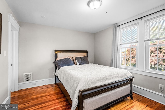 bedroom featuring hardwood / wood-style floors