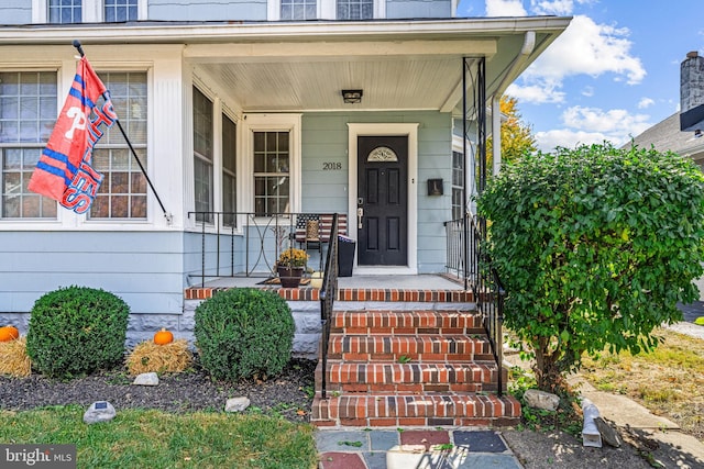 property entrance with a porch