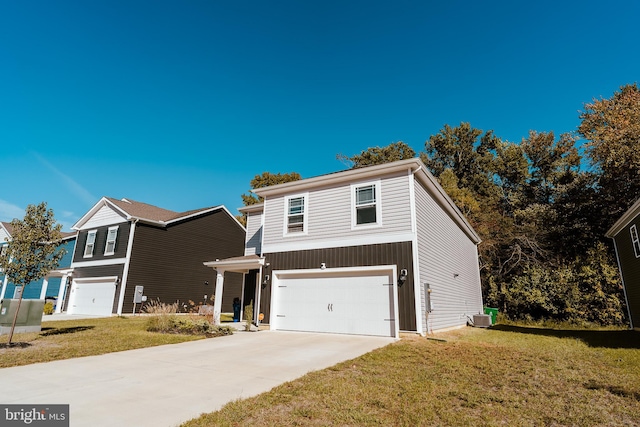 front of property featuring a front yard, central AC, and a garage