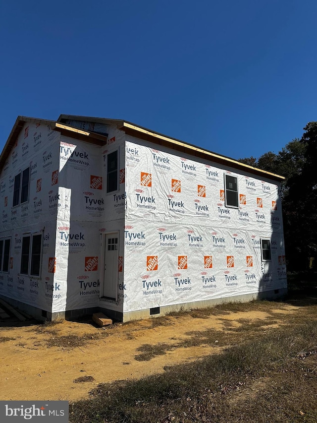 view of property exterior featuring crawl space