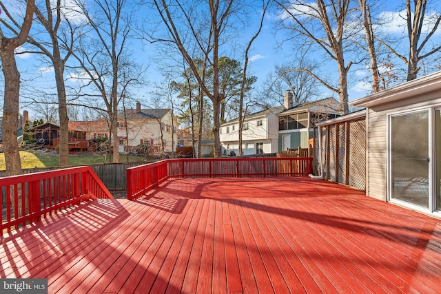 wooden deck with a residential view